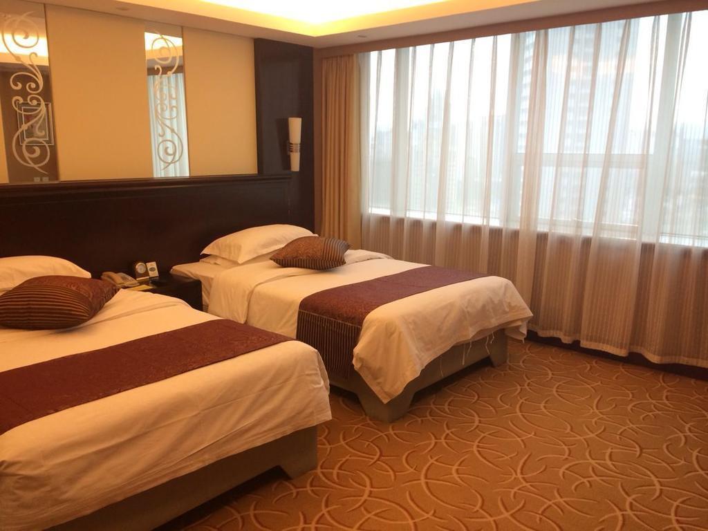 Green Land Hotel Kunming Rum bild